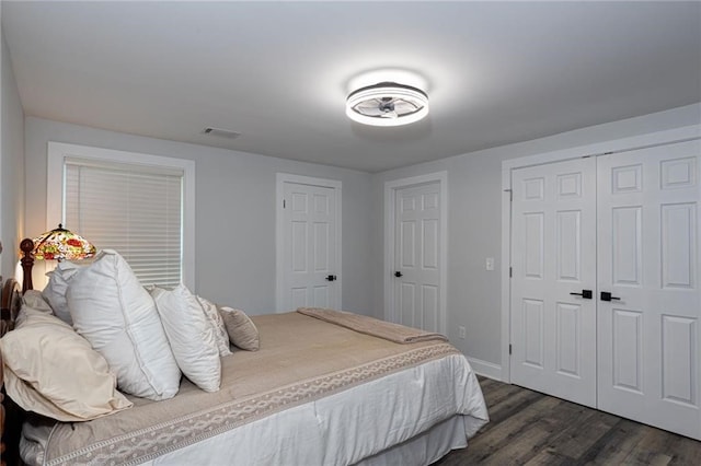 bedroom featuring dark hardwood / wood-style floors