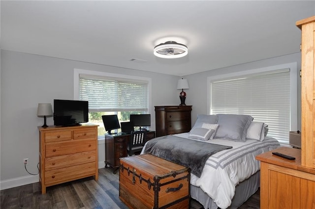 bedroom featuring dark hardwood / wood-style floors