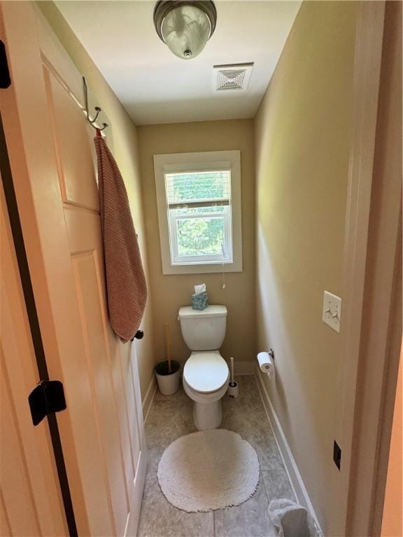 1521 Reynolds Dr, Auburn, AL 36830 - bathroom featuring toilet and baseboards