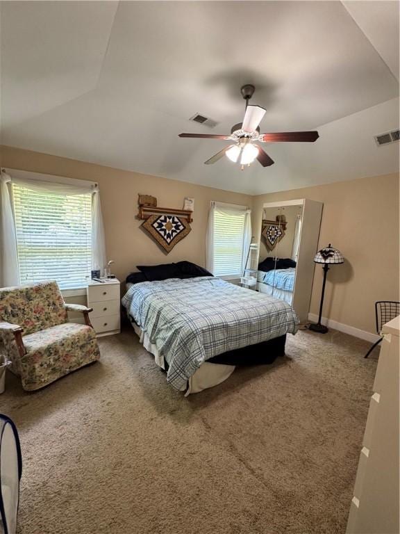 1521 Reynolds Dr, Auburn, AL 36830 - bedroom with multiple windows, carpet flooring, and ceiling fan