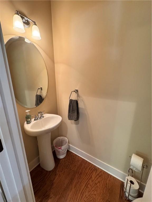 1521 Reynolds Dr, Auburn, AL 36830 - bathroom with wood finished floors and baseboards