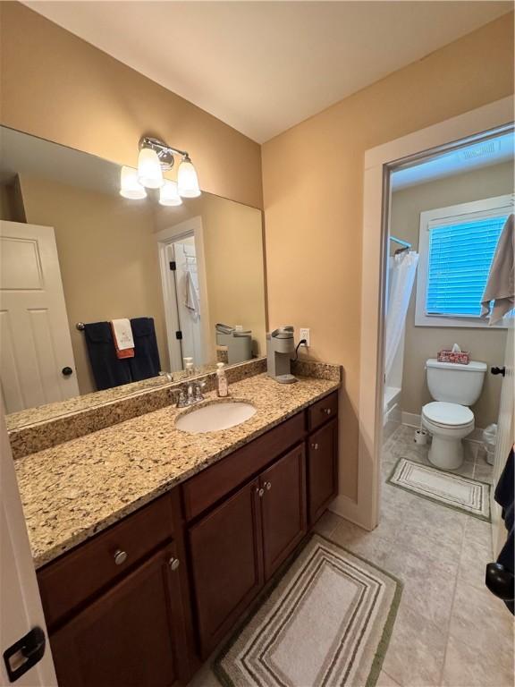1521 Reynolds Dr, Auburn, AL 36830 - full bath featuring vanity and tile patterned floors
