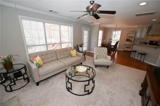 1798 Brookhaven Ct, Auburn, AL 36830 - living area with ornamental molding, visible vents, and a ceiling fan
