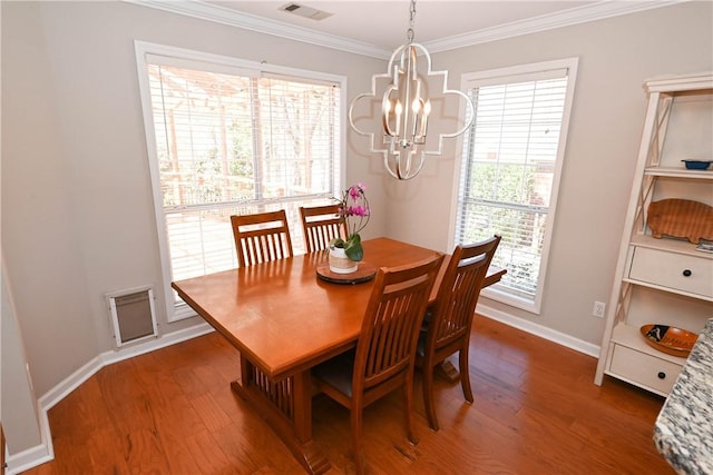 1798 Brookhaven Ct, Auburn, AL 36830 - dining space featuring a chandelier, baseboards, ornamental molding, and visible vents