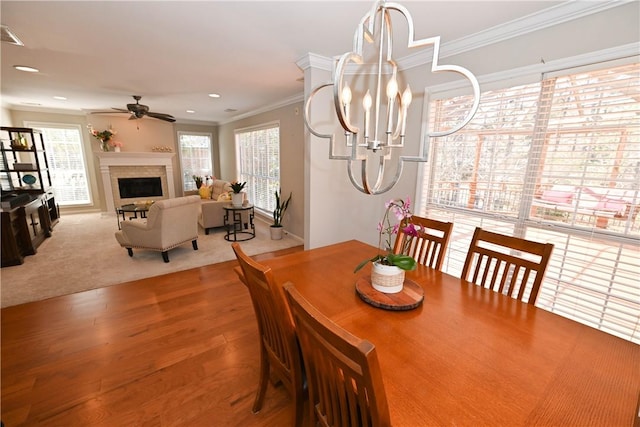 1798 Brookhaven Ct, Auburn, AL 36830 - dining area with ornamental molding, recessed lighting, a fireplace, ceiling fan, and wood finished floors