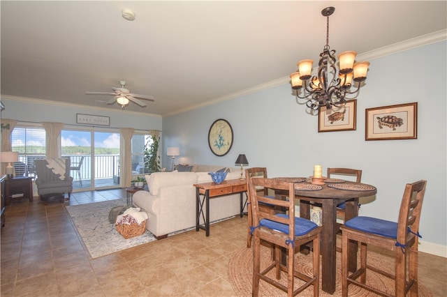 dining room featuring tile patterned floors, ceiling fan with notable chandelier, and ornamental molding