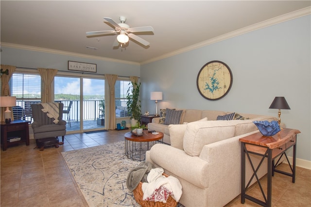 tiled living room with ceiling fan, plenty of natural light, and ornamental molding