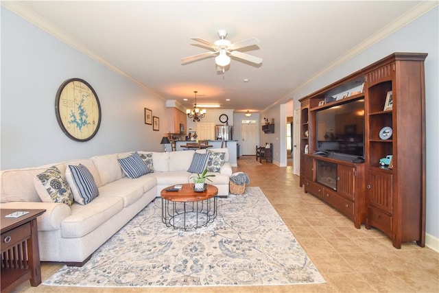 living room with ceiling fan with notable chandelier and ornamental molding