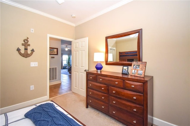 carpeted bedroom with crown molding