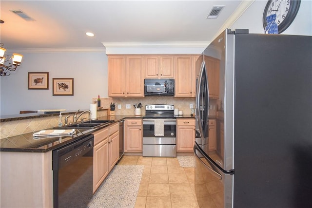 kitchen featuring sink, black appliances, light tile patterned floors, a notable chandelier, and hanging light fixtures