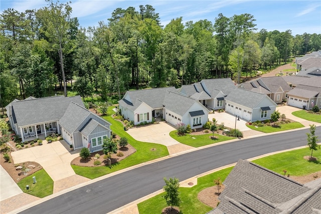 birds eye view of property with a residential view