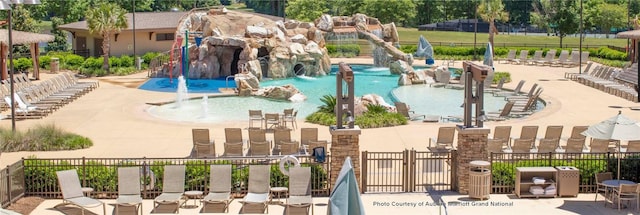 view of pool with fence