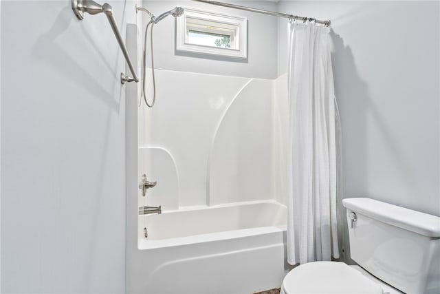 full bathroom with toilet and shower / tub combo