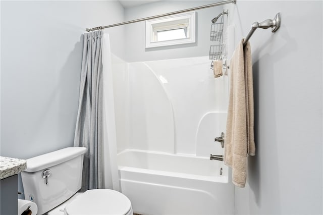 full bathroom with vanity, toilet, and shower / tub combo