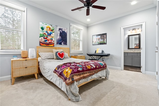 bedroom with baseboards, recessed lighting, ensuite bathroom, light carpet, and crown molding