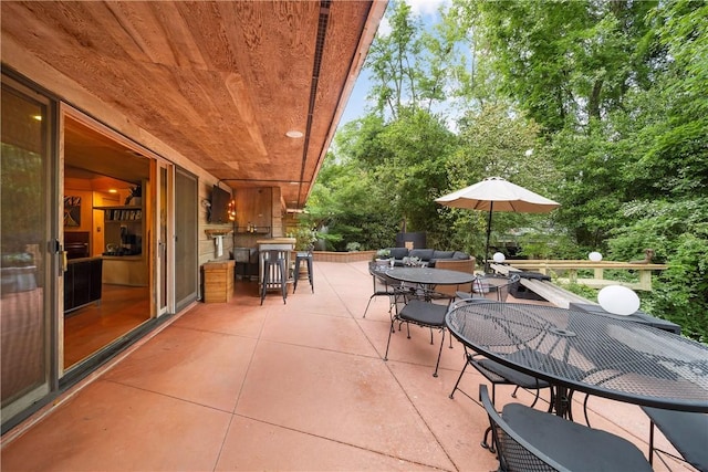 view of patio with outdoor dining area
