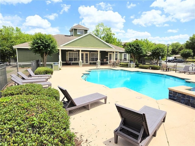 view of swimming pool with a patio area