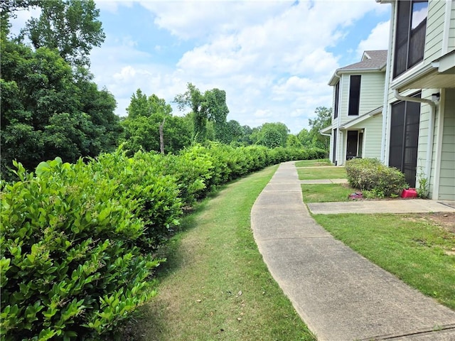 view of community with a lawn