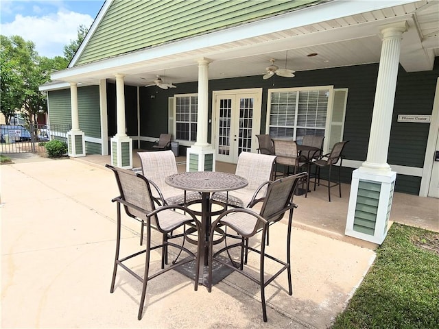 view of patio featuring ceiling fan and french doors