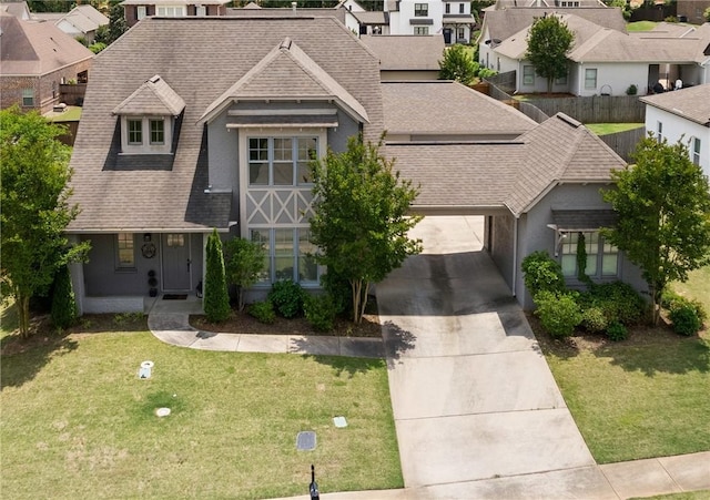 1195 Southridge Ct, Auburn, AL 36830 - view of front of house with a shingled roof, a residential view, concrete driveway, and a front lawn