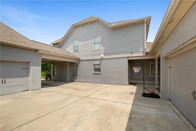 1195 Southridge Ct, Auburn, AL 36830 - view of side of home with brick siding and roof with shingles