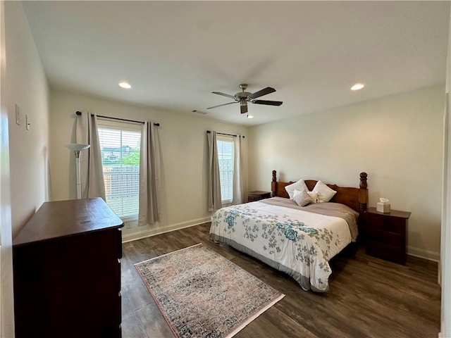 bedroom with recessed lighting, baseboards, ceiling fan, visible vents, and dark wood-style floors