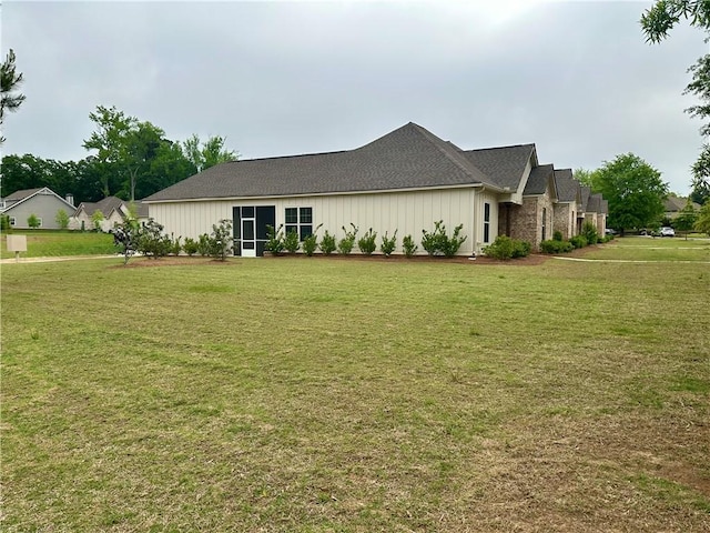 view of property exterior with a yard