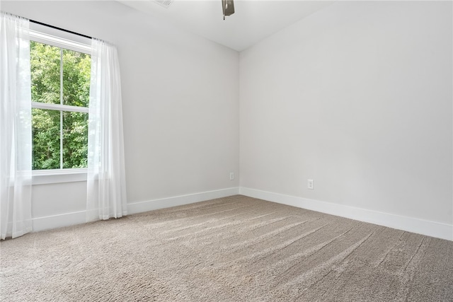 630 Village Dr Unit 15, Opelika, AL 36801 - spare room featuring baseboards and carpet flooring