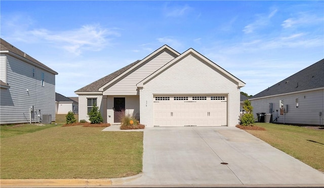 view of front facade featuring a front yard, a garage, and cooling unit