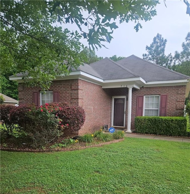 714 Ellis St N, Auburn, AL 36832 - ranch-style house with a front lawn and brick siding