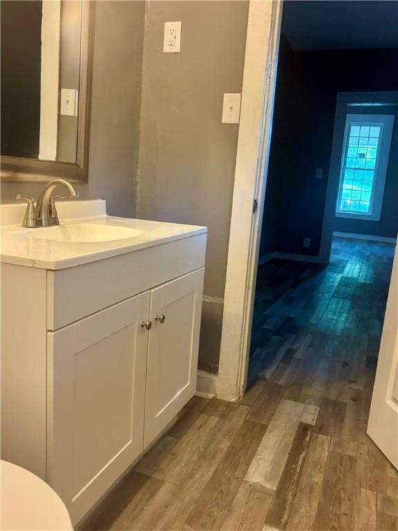 204 S 1st Pl, Opelika, AL 36801 - bathroom featuring vanity and wood finished floors