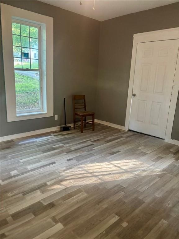 204 S 1st Pl, Opelika, AL 36801 - empty room with wood finished floors and baseboards
