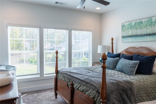 carpeted bedroom with ceiling fan