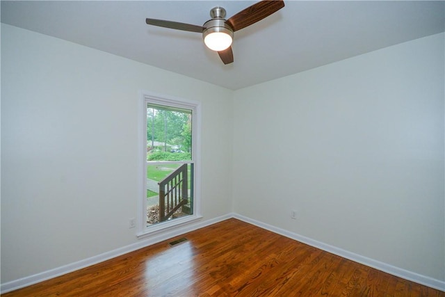 222 Green St, Auburn, AL 36830 - empty room featuring baseboards, wood finished floors, and a ceiling fan
