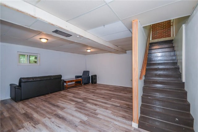 222 Green St, Auburn, AL 36830 - living room with stairway, wood finished floors, and a drop ceiling