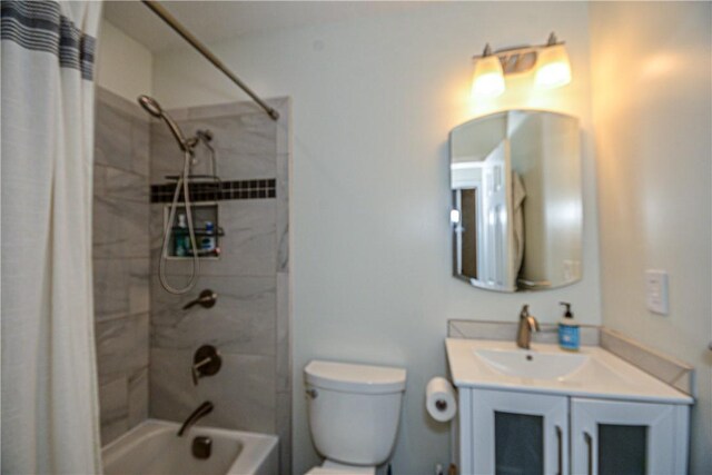222 Green St, Auburn, AL 36830 - full bathroom featuring shower / bath combo, vanity, and toilet