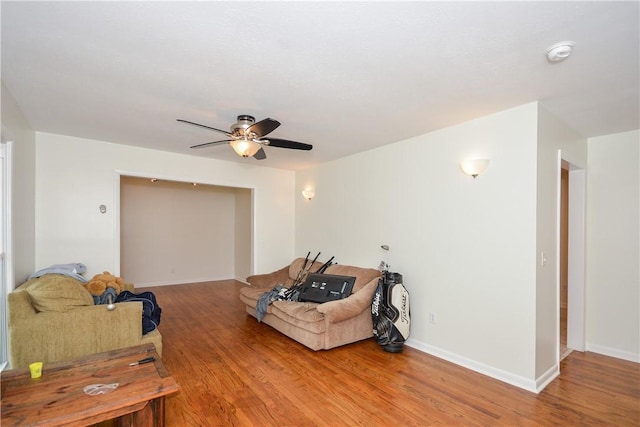 222 Green St, Auburn, AL 36830 - living area featuring wood finished floors, ceiling fan, and baseboards