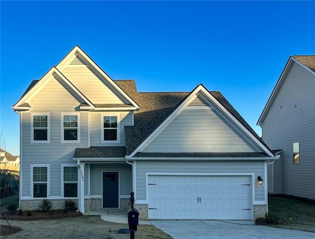 craftsman house with a garage