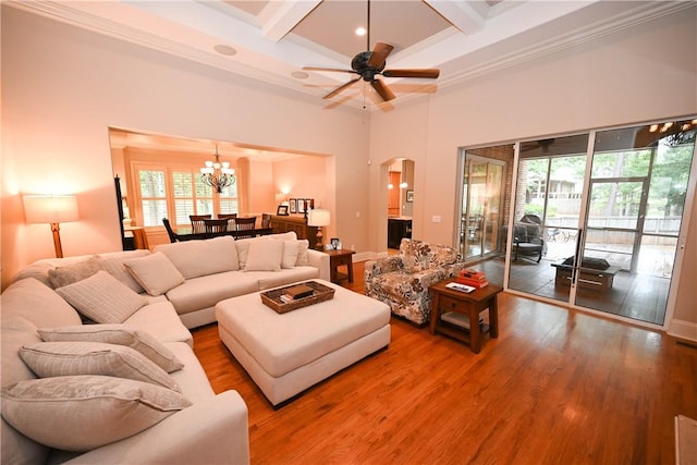 1618 Olivia Way, Auburn, AL 36830 - living room with beam ceiling, coffered ceiling, wood finished floors, a chandelier, and arched walkways
