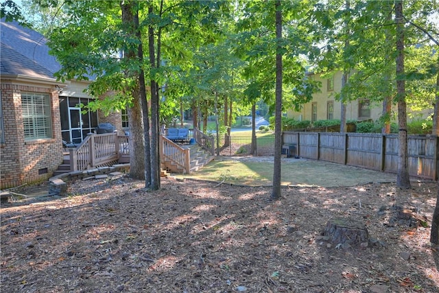 view of yard with a deck