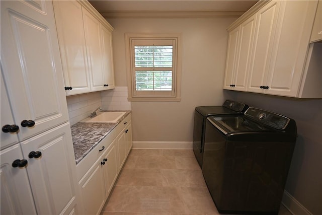 1618 Olivia Way, Auburn, AL 36830 - laundry area with cabinet space, washer and clothes dryer, and crown molding