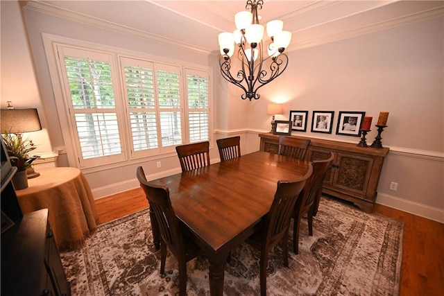 1618 Olivia Way, Auburn, AL 36830 - dining room with a chandelier, wood finished floors, and crown molding