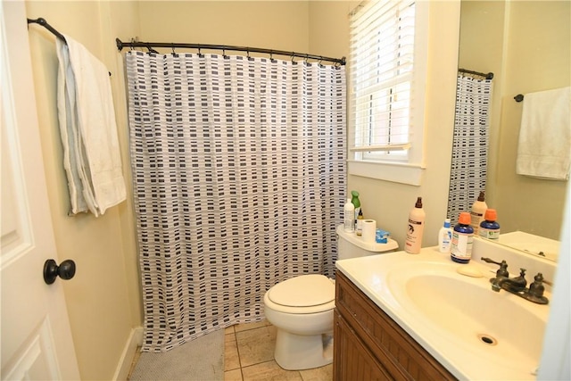 full bath featuring tile patterned flooring, toilet, vanity, and a shower with curtain