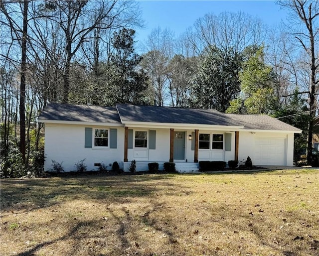 single story home with an attached garage and a front yard