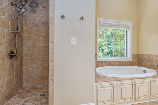 bathroom with independent shower and bath