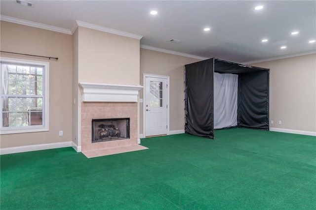 unfurnished living room with carpet flooring, ornamental molding, and a tiled fireplace