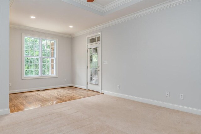 spare room featuring ornamental molding