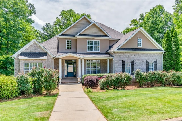 view of front of home with a front lawn