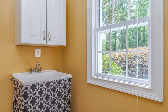 laundry area featuring a healthy amount of sunlight