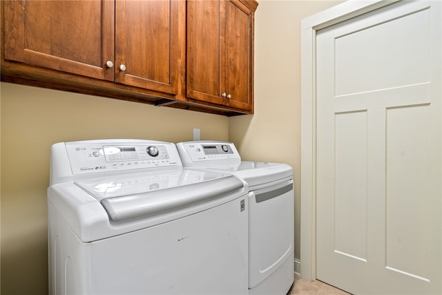 3515 Double Eagle Ln, Opelika, AL 36801 - washroom featuring washing machine and clothes dryer and cabinet space